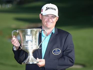 J.B Holmes with the Wells Fargo Championship trophy